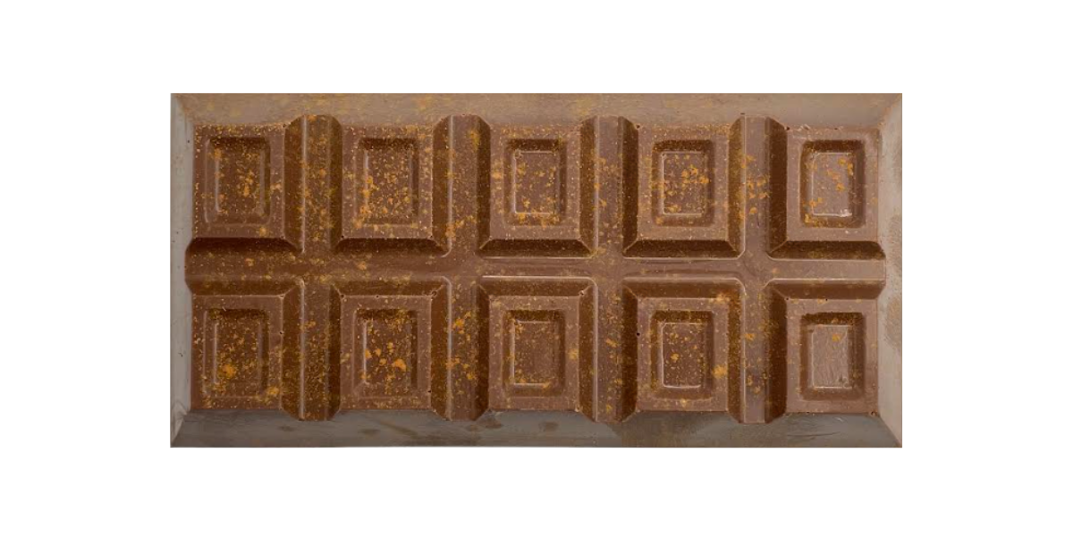 Cinnamon S'mores dessert bar stuffed with Cinnamon Cake, Marshmallow, Cinnamon Cracker, Vanilla Creme and Cinnamon Dust