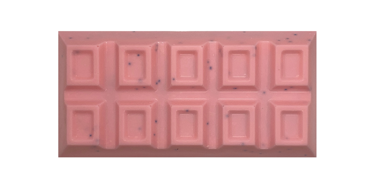 Pink chocolate bar with blue sprinkles stuffed with vanilla frosting, vanilla cake & cotton candy