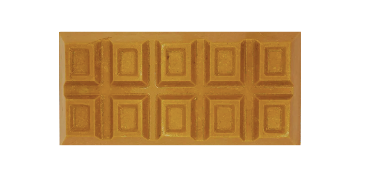 Dark golden orange PB Rice Krispy chocolate bar stuffed with Reese's peanut butter, marshmallow cream & Rice Krispies
